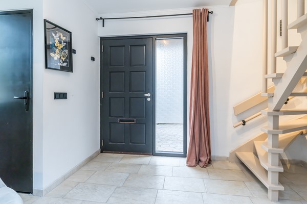Foto - Te koop: Dr. Calsstraat 48 Landgraaf Instapklare uitstekend onderhouden geschakelde 2 kap woning in Schaesberg